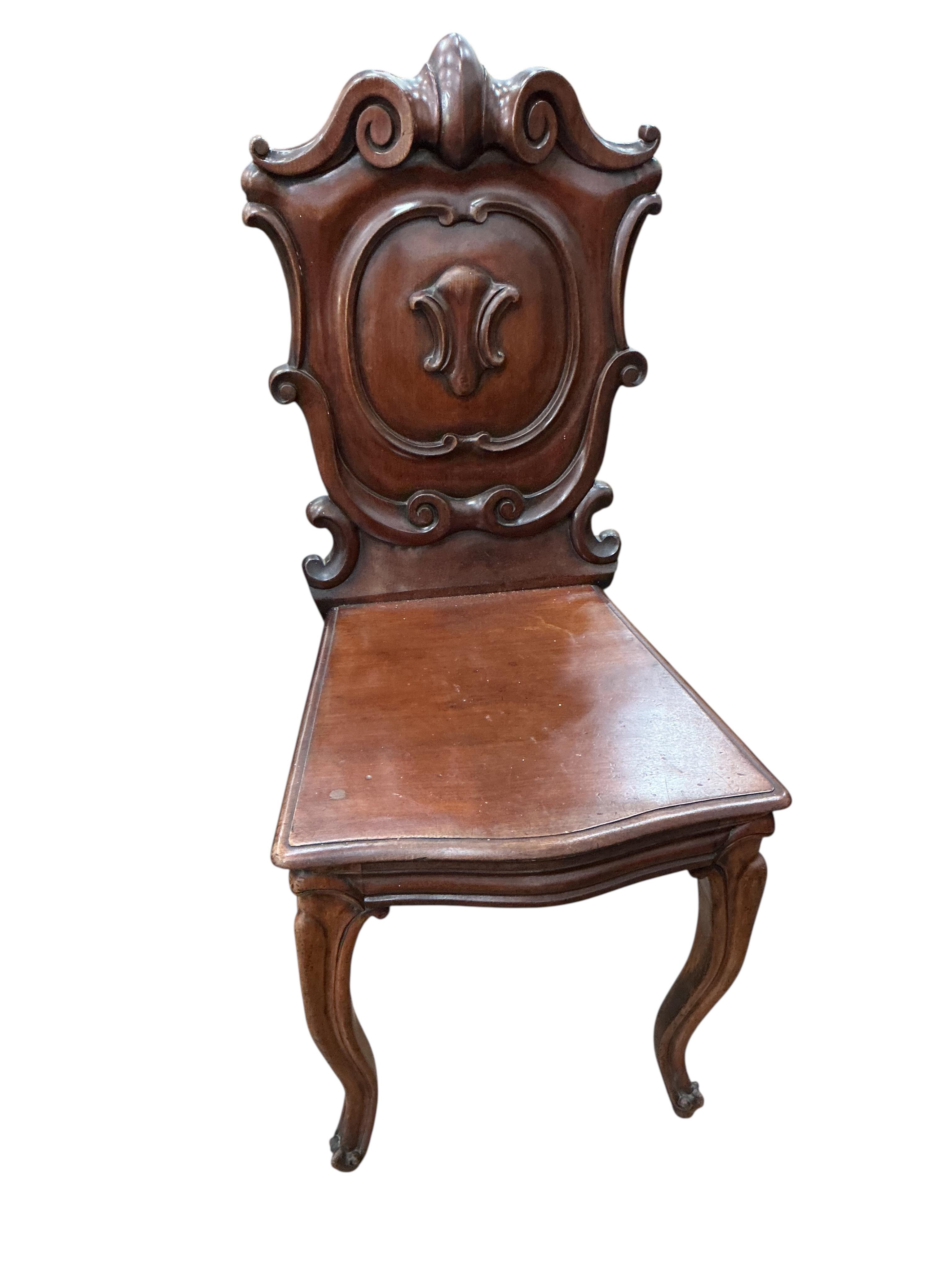 Three (two plus one) Victorian mahogany hall chairs